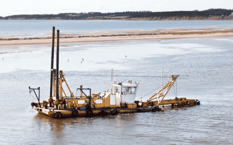 how does a sand dredge work
